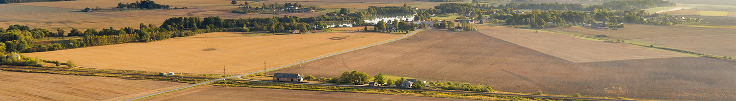 Brown agricultural fields in autumn time.